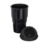 The portable car dustbin fitting perfectly inside a standard vehicle center console cup holder.